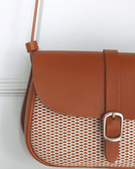 Bolsa It-bag "Le Mignon" de cuero marrón con cortes laser