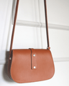 Bolsa It-bag "Le Mignon" de cuero marrón con cortes laser