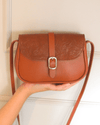 Bolsa It-bag "Le Mignon" de cuero marrón estampado