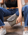 Bolsa It-bag "Le Croco" de cuero verde con estampados